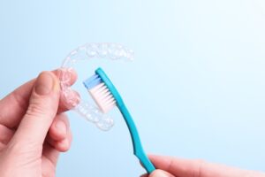 brushing Invisalign aligner