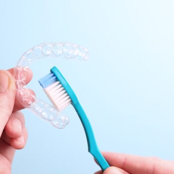 brushing Invisalign aligner